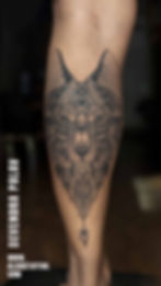 geometric wolf tattoo