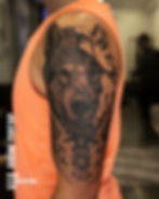 half geometric and realism wolf tattoo