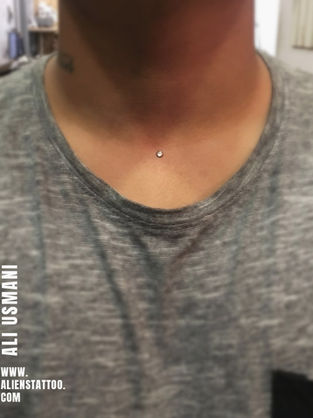 dermal piercing at aliens tattoo