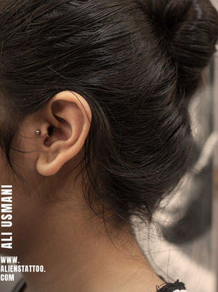 helix piercing At Aliens Tattoo Studio