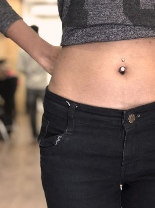 belly piercing at aliens tattoo