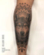 realism and mandala wolf tattoo