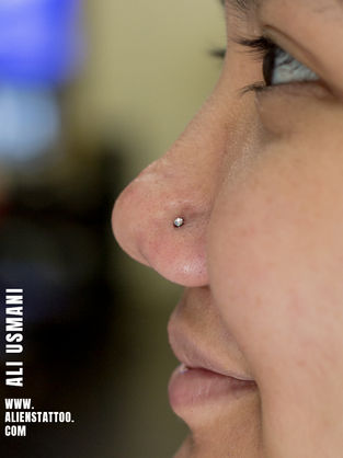 nose piercing At Aliens Tattoo Studio
