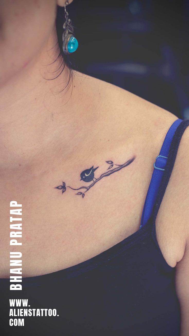 small blue bird tattoo