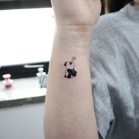 miniature panda tattoo
