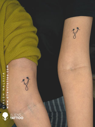 matching couple tattoo