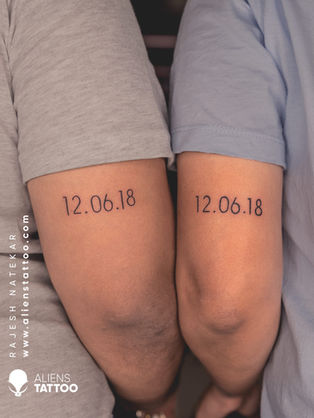 date couple tattoo