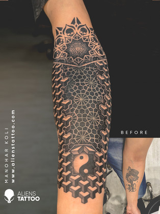 geometric blackwork coverup tattoo